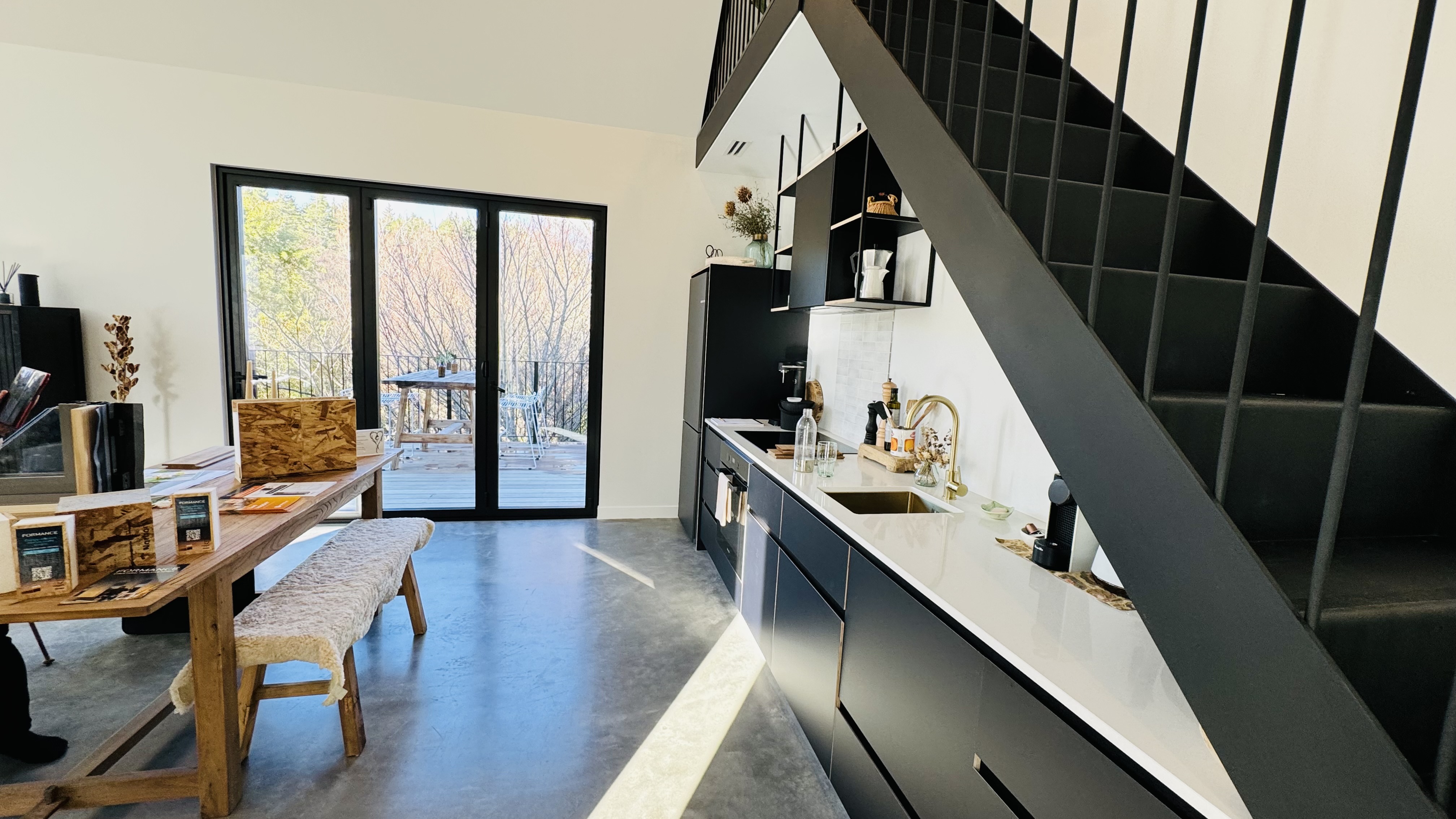Living area interior with natural materials palette and Homestar 8 features