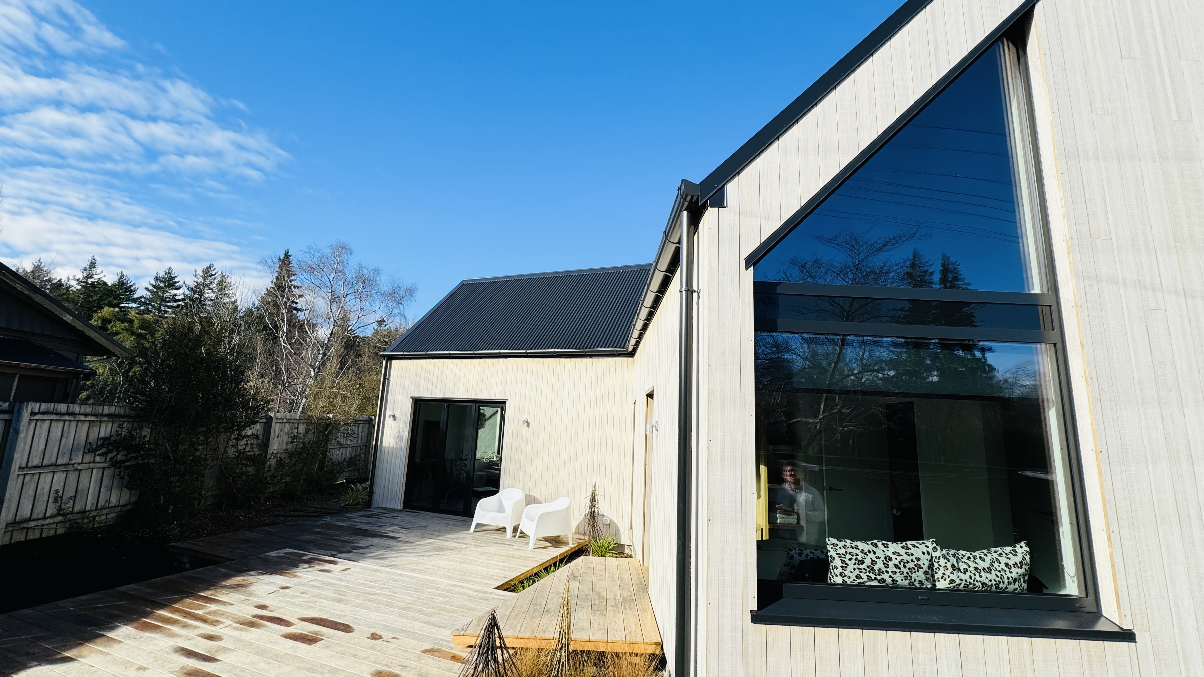 Mountain-facing facade designed for passive solar gain in alpine climate